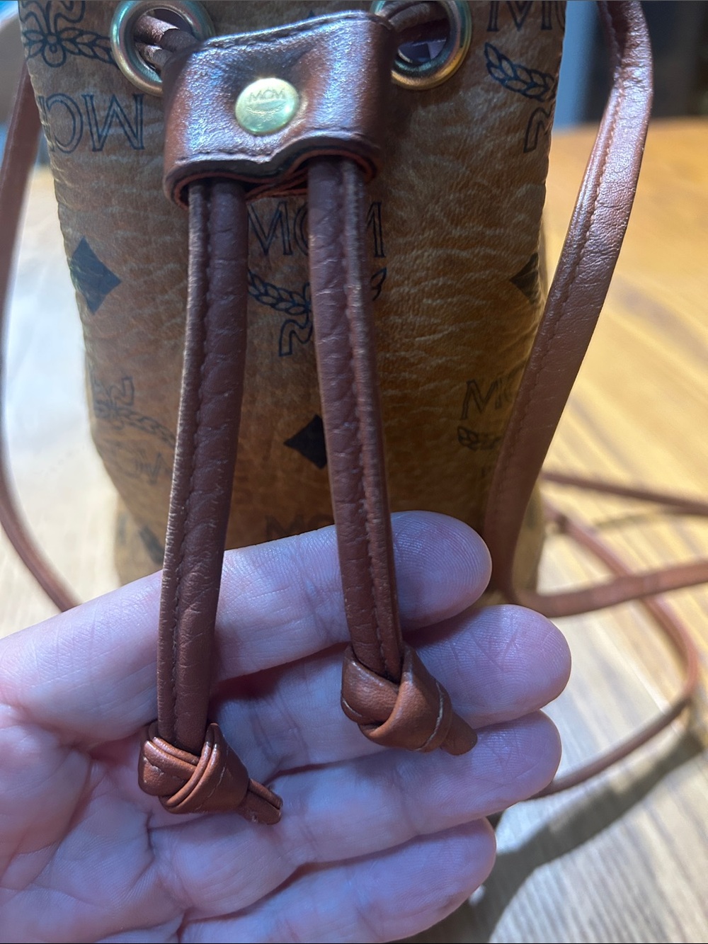 MCM Cognac Brown Monogram Leather Drawstring Mini Bucket Bag - Picture 3 of 11